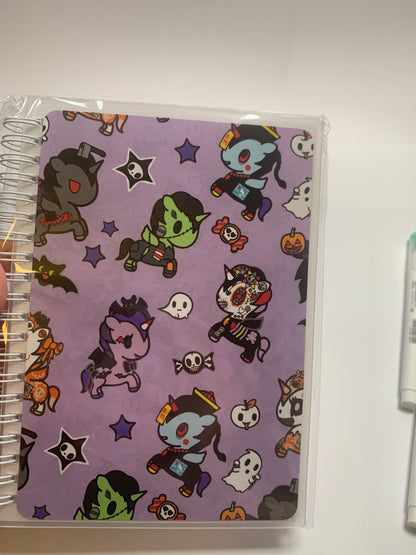 Spooky unicorn reusable sticker book